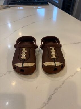 CROCS Kids Brown Football-Style Clogs with White Accents - Size 10
